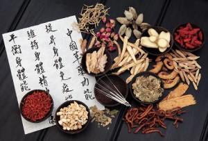 A table with various chinese herbs and writing.